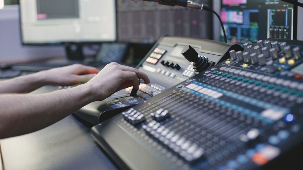 2. Singer and music arranger collaborating in a modern Bhubaneswar studio